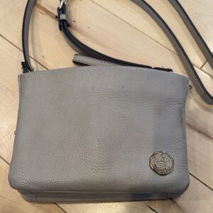 Light Gray Leather Crossbody Bag with Medallion Accent